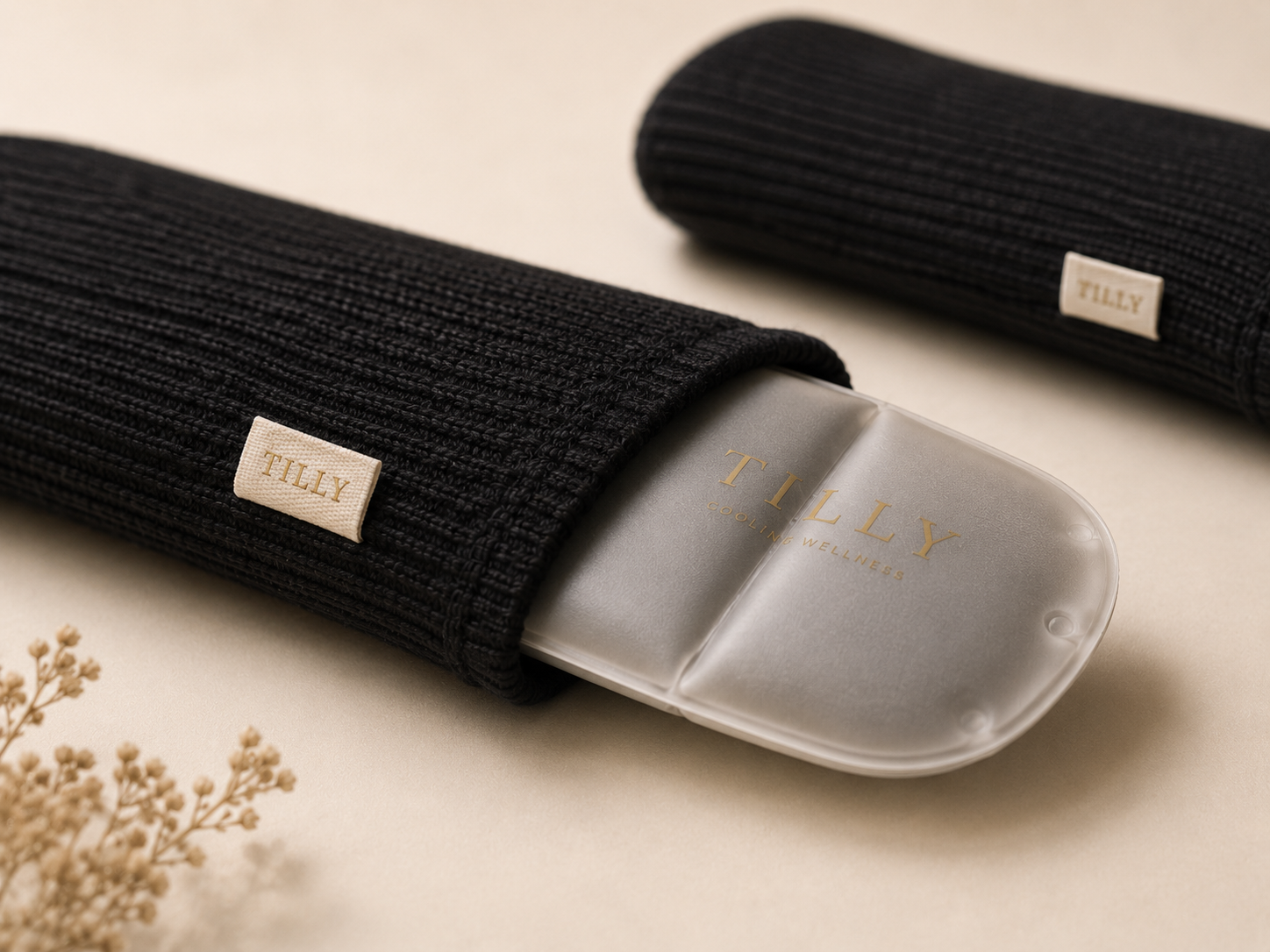 Close-up of the chambered Tilly pack sliding into the washable cotton sleeve